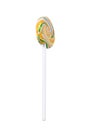 Lollipop, with a yellow-green pattern, side view, on a white background, close-up Royalty Free Stock Photo