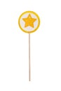 Lollipop with yellow star on white background. Colorful handmade lemon Lollipop on white background. Studio shot Royalty Free Stock Photo