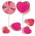 Lollipops and candy heart shaped on white