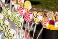 Lollipops delicious wrapped in cellophane. Colorful swirly lollipops