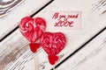 Lollipops and red hearts. Royalty Free Stock Photo