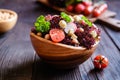 Lollo rosso salad with chickpeas, tomato, radish and croutons