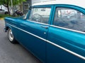 old blue Ford Customline V8 tudor sedan 1955-1956. Side view. CADEAA 2021 classic cars. Copyspace