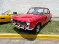 sporty red Fiat 1500 coupe Vignale fastback built in Argentina, late 1960s. CADEAA 2021 classic cars Royalty Free Stock Photo