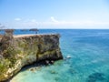 Lombok - A boy and the Pink Beach Cliff