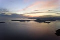 Lombok, Indonesia, south Gili islands. Aerial drone view on  silhouette of  hills Gili Gide island in the sea at sunset Royalty Free Stock Photo