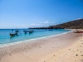 Lombok - Pink Beach with plenty of boath anchored to the shore