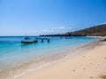 Lombok - Pink Beach with plenty of boath anchored to the shore