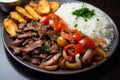 Lomo Saltado: Peruvian Stir-Fry Sirloin with Rice and Fries