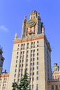 Lomonosov Moscow State University MSU tower with thermometer on a blue sky background Royalty Free Stock Photo