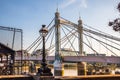 London, Albert bridge in Chelsea and Thames river at sunset Royalty Free Stock Photo