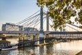 London, Albert bridge in Chelsea and Thames river at sunset