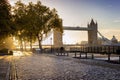 London in autumn season: golden sunrise behind the Tower Bridge Royalty Free Stock Photo