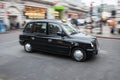 London black cab taxi in motion Royalty Free Stock Photo