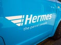A London blue Hermes delivery van, showing it`s side door logo.