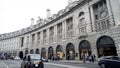 London, Britain-September, 2019: Apple store is located in old architectural building of European city. Action. Walking