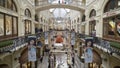 London, Britain-September, 2019: Beautiful interior of trading house with old architecture. Action. People walking Royalty Free Stock Photo