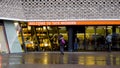 London, Britain-September, 2019: Entrance to popular European gallery of modern art. Action. Rear view of young people