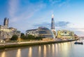 London buildings and Thames reflections