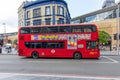 London bus crossing against the Shipwright Arms public house on Tooley Street