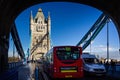 London bus passing under arch on iconic Tower Bridge in London, UK Royalty Free Stock Photo