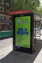 UK, London,A London bus shelter sign saying passengers must wear a face mask