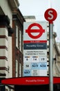 London Bus Stop at Piccadilly Circus Royalty Free Stock Photo