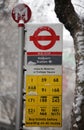 London bus stop in the snow