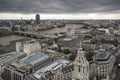 London city aerial view over skyline with dramatic sky and landm