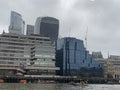 London city financial centre seen from a cruising boat on Thames river in 2023