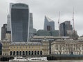 London city financial centre seen from a cruising boat on Thames river in 2023