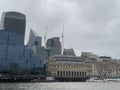 London city financial centre seen from a cruising boat on Thames river in 2023