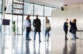 LONDON, City Hall interior with people blur. Background Royalty Free Stock Photo