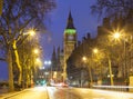 London city scene with red bus and Big Ben in background. Royalty Free Stock Photo