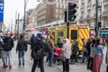 LONDON, ENGLAND - SEPTEMBER 25, 2017: London Cityscape and downtown Oxford Street with people and traffic. Emergency Ambulance.