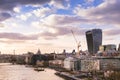 London cityscape with modern buildings, Saint Paul`s Cathedral and the river Thames in sunset light Royalty Free Stock Photo