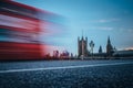 London. Classic red double decker bus crossing Westminster Bridge in front of House of parliament and Big Ben in London