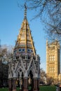 LONDON - DEC 9 : Buxton Memorial Fountain in Victoria Tower Gardens in London on Dec 9, 2015. Unidentified people.