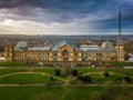 London, England - Aerial panromaic view of Alexandra Palace in Alexandra Park with iconic red double-decker bus