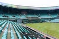 London, England - Aril 5, 2012: Wimbledon tennis stadium. Tennis centre court with empty seats in London, England Royalty Free Stock Photo