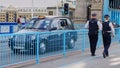 Male and Female Bobbies patrol Tower Bridge