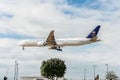 LONDON, ENGLAND - AUGUST 22, 2016: HZ-AK21 Saudi Arabian Airlines Boeing 777 Landing in Heathrow Airport, London. Royalty Free Stock Photo