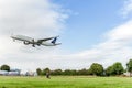 LONDON, ENGLAND - AUGUST 22, 2016: HZ-AK21 Saudi Arabian Airlines Boeing 777 Landing in Heathrow Airport, London. Royalty Free Stock Photo