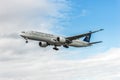 LONDON, ENGLAND - AUGUST 22, 2016: HZ-AK21 Saudi Arabian Airlines Boeing 777 Landing in Heathrow Airport, London. Royalty Free Stock Photo