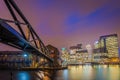 London, England - Colorful night sky at Canary Wharf financial district with skyscapers Royalty Free Stock Photo