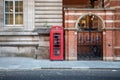 London, England Ã¢â¬â December 2022. Classic, retro red phone booth. London\'s vintage phone boxes are one of the symbols