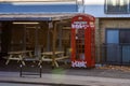 London, England Ã¢â¬â December 2022. Classic, retro red phone booth. London\'s vintage red phone boxes in Punk version