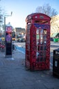 London, England Ã¢â¬â December 2022. Classic, retro red phone booth. London\'s vintage red phone boxes in Punk version