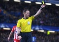 Dutch FIFA referee Danny Makkelie shows a yellow card