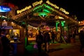 LONDON, ENGLAND, DECEMBER 28, 2018: People enjoying a pleasant time in a Christmas market, surrounded by food and drink stands,